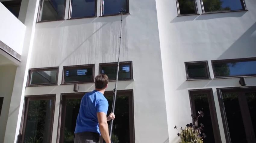 San Clemente Window Wash technician cleaning residential glass