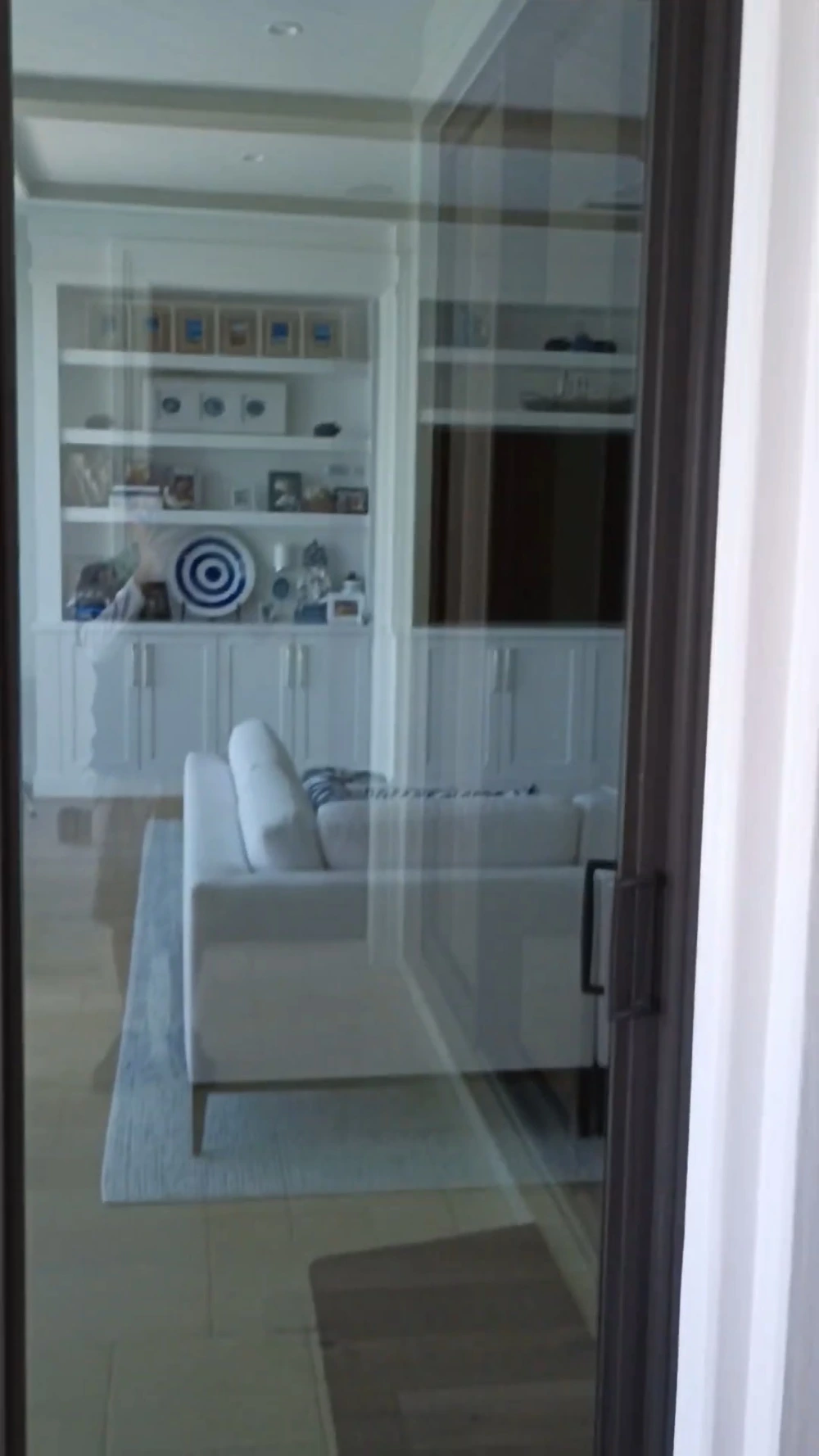 Clear, streak-free sliding glass door after professional cleaning, San Clemente, CA